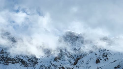 Snowy Mountains With Clouds