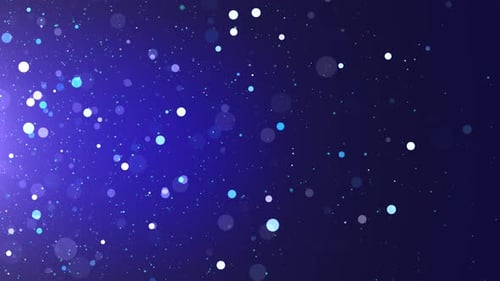 Des particules bleues de poussière volent dans l'air en arrière-plan.