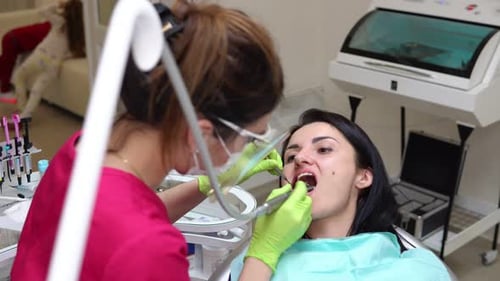 Dental Procedure with Caring Professional in Bright Clinic