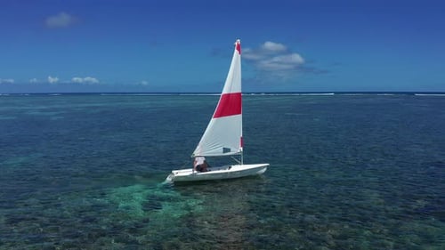 Elderly Man Sailing on Yacht at the Indian Ocean