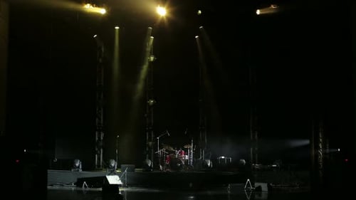 Concert Stage with Drum Set and Concert Lighting