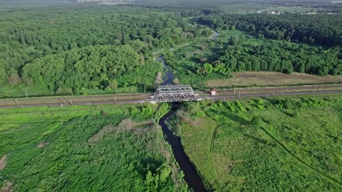 Aerial View of Railway Bridge Across the River in the Early Morning