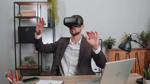 Businessman Working Using Virtual Reality Futuristic Technology VR App Headset Helmet at Home Office