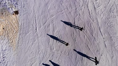 Aerial flight above mountain ski resort Сable car lifts in