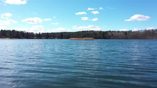 Low Drone Flight Above Lake