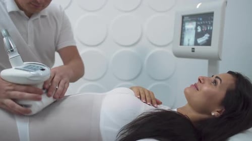 Woman Receiving Medical Massage at a Clinic