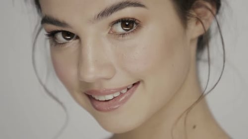Beautiful Woman's Face in Close-Up Studio Shot