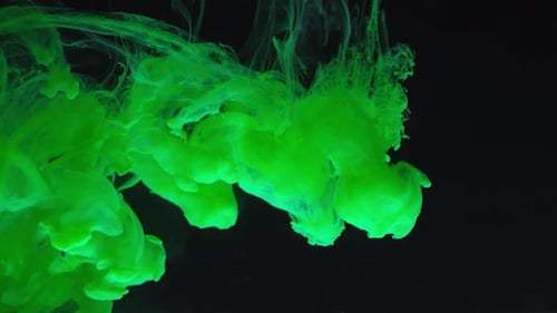 Green Paint Flowing in Water