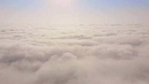 Aerial View Above a Sea of White Clouds