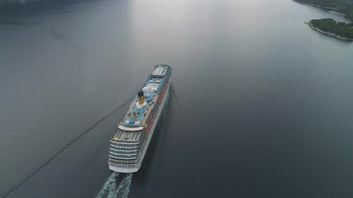 Large Luxury Cruise Liner Is Going in Fjord of Norway. Aerial View. Reveal Shot