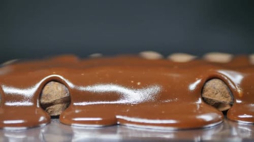 Chocolate Drizzled over Delicious Chocolate Truffles Close Up