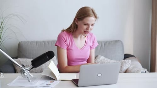 Woman Recording Podcast at Home Studio