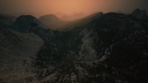 Dramatic Sky Over Rocky Mountains at Sunset