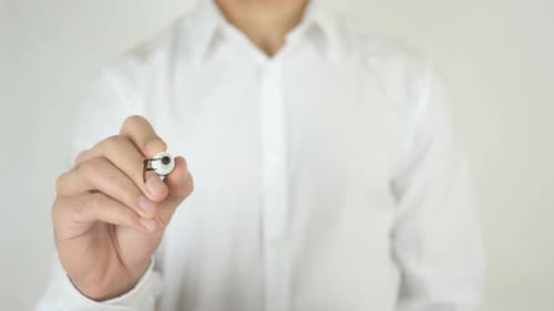 Person Writes Free Delivery on Clear Surface