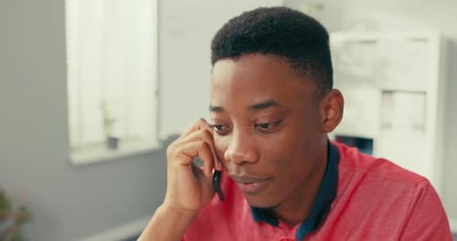 An Experienced Sales Department Company Employee Sits at Desk in Office Laptop Stands in Front of