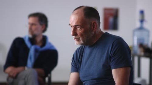 Man Speaking in a Group Therapy Session