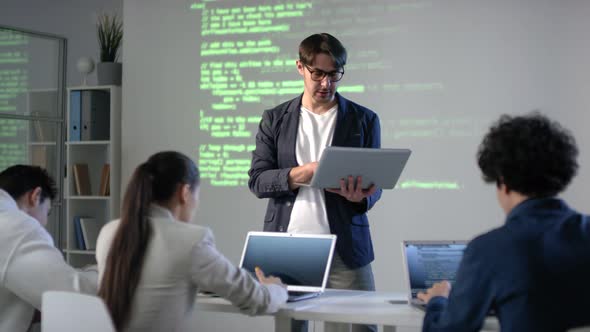 Man Teaching Students Software Coding in Classroom, Technology Stock ...