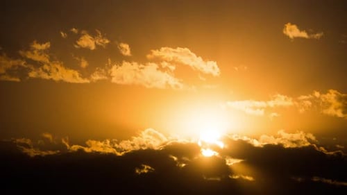 Golden Sunset Time-Lapse with Clouds and Sun Rays