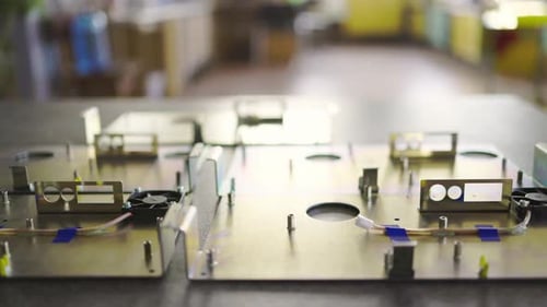 Slider Shot of a Blank Metal Components in Workshop Laboratory