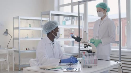 Two Diverse Scientists in Lab