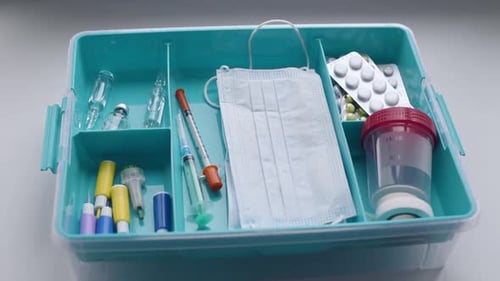 Medical Supplies Organized in Turquoise Box