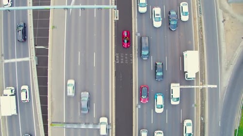 Cars and Trucks Driving on City Highway