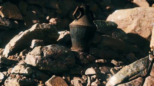 Old Metal Jug at Rocks