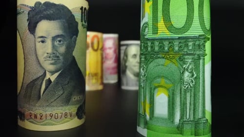 Foreign currency money exchange concept. Many banknotes of different nations.