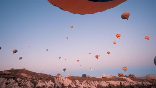Breathtaking Hot Air Balloons Floating at Sunrise