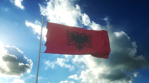 Albania Flag Waving in Realistic Cloudy Sky