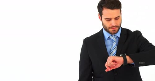 Businessman checking time