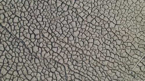 Cracked Earth Texture from Overhead Aerial View