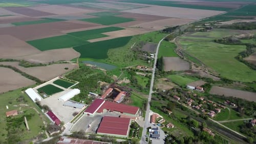 Small towns and farmland dot the Bulgarian countryside. An aerial view of the varied cash crops of t