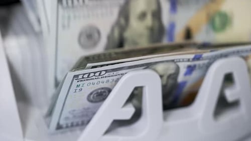 US dollar banknote in counting machine. Automatic mechanism for bank financial operations.