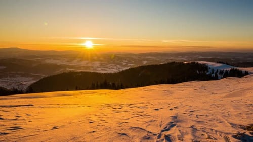 Sundown Time Lapse in Winter Mountain