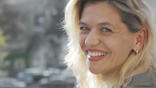 Close Up of Smiling Woman with Blonde Hair