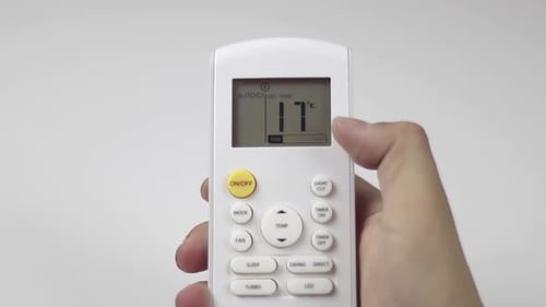 Hand Increasing Temperature on Remote Control
