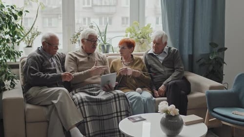 Seniors Talking at Sofa in Nursing Home