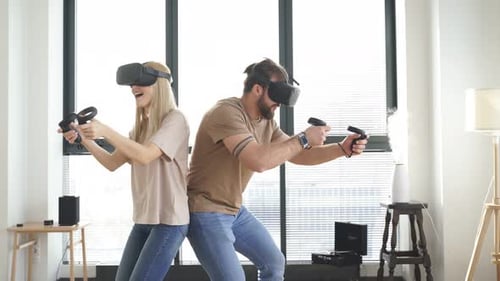 Couple Playing Virtual Reality Game at Home