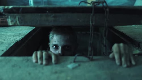 Disturbing Man Emerging From Creepy Crawl Space