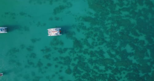 Aerial View of Boats on Tropical Reef