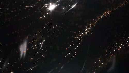 Elegant Sparkling Golden Particle Waves Background