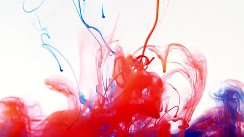 Abstract Red and Blue Ink Swirling Together