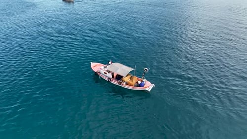 Fishing boat goeas to sea aerial view Turkey Alanya 4 K