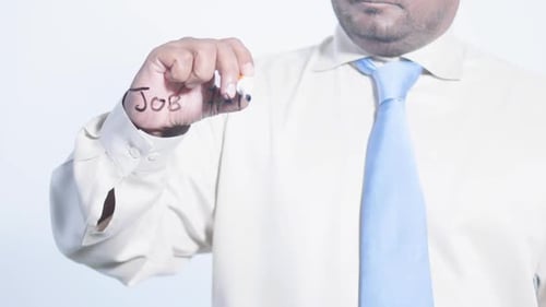 Business Person Writes Job Fair On Glass
