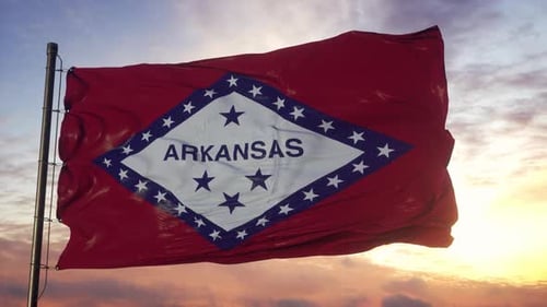 Realistic Arkansas Flag Waving in Sunset Sky