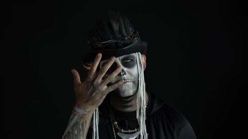 Spooky Skeleton Costume Reveal on Black Background