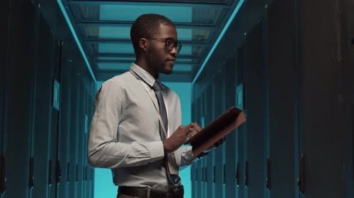 Portrait of IT Technician in Data Center