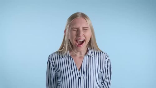 Pretty Blonde Girl Shouting Loudly