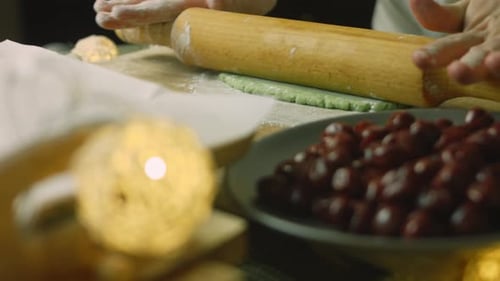 Dough Rolled Thin on Wooden Cutting Board